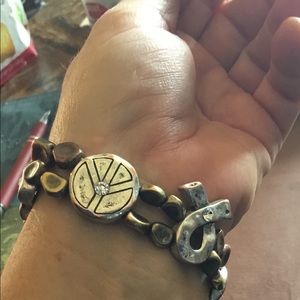 Peace n love elasticated bracelet,silver tone,